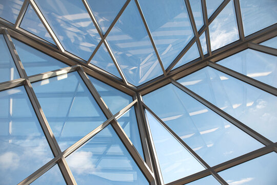Steel beams of a glass roof of a modern building in Paris - Powered by Adobe