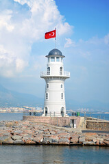 Fototapeta na wymiar Lighthouse in the port of Alanya, Antalya, Türkiye