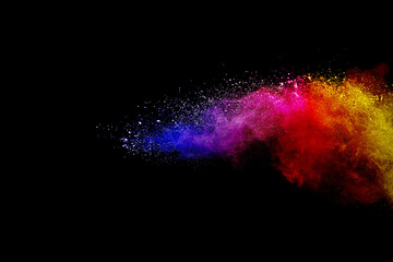 Dust motion of color powder explosive and splash isolated on black background