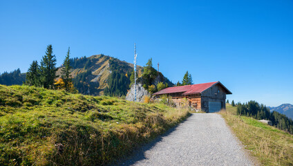 Fototapeta premium hiking route to mountain restaurant at Wallberg, autumnal landscape bavaria