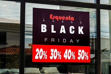 Marilia, Sao Paulo, Brazil. November 11, 2023. sign written in Portuguese: Black Friday heats up, and respective discount percentages. Black Friday starting in Brazilian commerce