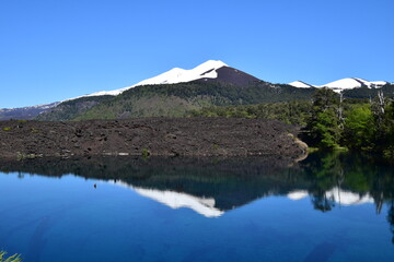 National Park Conguillio in Chile: a paradise of lagoons, araucarias, and volcanoes.

