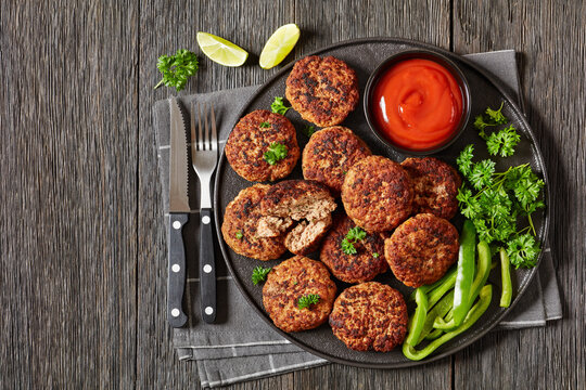 german frikadellen of ground meat on a plate