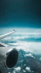 Flugzeugaussicht über den Wolken - obrazy, fototapety, plakaty