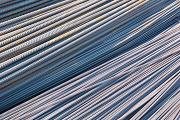 Fototapeta premium Reinforcements steel bars stack, building armature with surface with improved grip, metal reinforcement for reinforced concrete structures