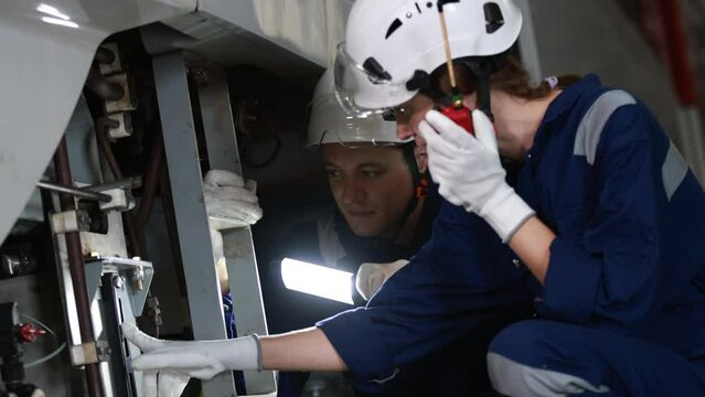 Rail engineer service and maintenance underbody of electric train