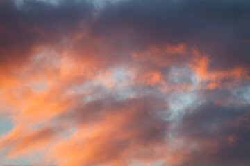 evening clouds illuminated by the setting sun