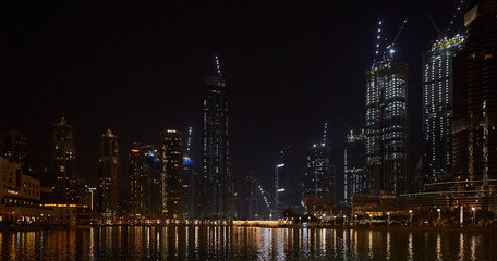 Obraz premium Panorama of downtown district of Dubai located around Burj Khalifa lake. Dubai, UAE - 2 February, 2020