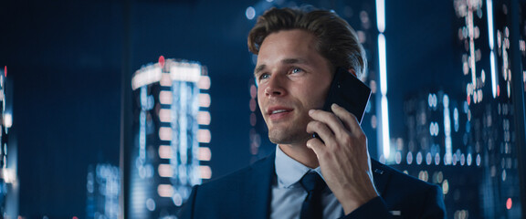 Close Up Portrait of Handsome Caucasian Businessman in Stylish Suit Standing Next to Window in Big...