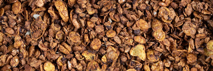 Organic roasted granola cereal banner. Top view muesli background texture panoramic web header....