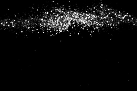 White gray blurred bokeh lights on black background. Glitter sparkle stars for celebrate. Overlay for your design