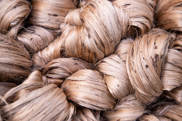 Thick Golden bundle of raw jute fiber abstract Pattern Texture Can be used as a Background...