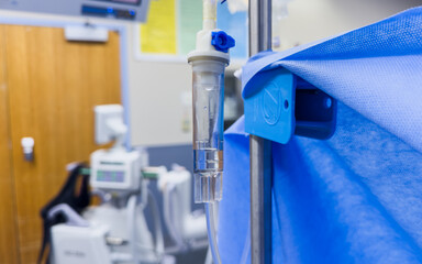 hospital drips against a sterile background, medical equipment providing care and treatment
