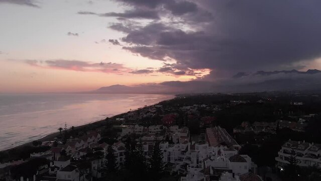 Elviria amazing sunset oceans and houses and mountains
