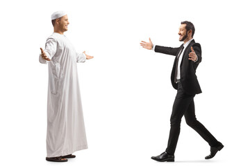 Fototapeta premium Businessman meeting a muslim friend in ethnic clothes