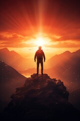 Obraz premium Silhouette of a person standing on top of a mountain. Accomplishing and setting goals concept. New Years resolutions.