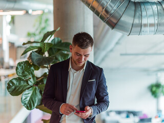 In a sleek corporate setting, the young and charismatic director strides confidently down the...