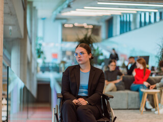 In a modern office, a young businesswoman in a wheelchair is surrounded by her supportive colleagues, embodying the spirit of inclusivity and diversity in the workplace