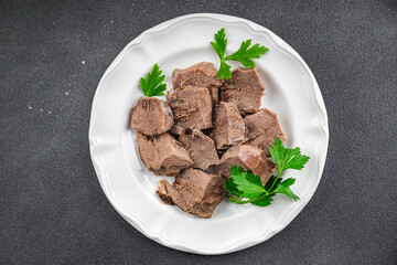 tongue meat food cooked fresh healthy eating cooking appetizer meal food snack on the table copy space food background rustic top view