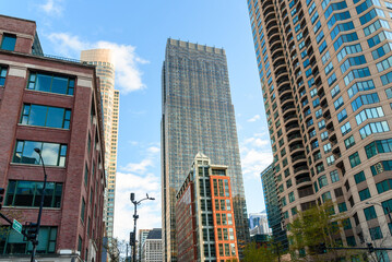 Low angle view of high rise residential and office buildings on a sunny spring day