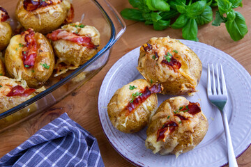 Baked potatoes with bacon and mozzarella