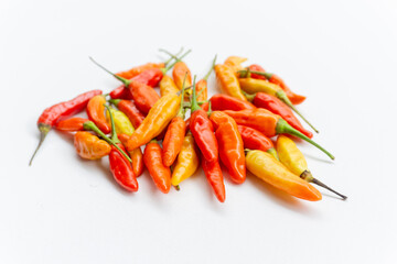 Red chili peppers. Red hot chili peppers isolated on white background. Colorful chili peppers. Spicy red chili peppers.
