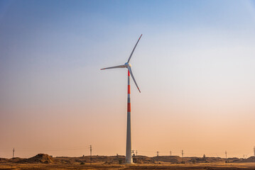 Wind turbines for renewable electric power production in India's second largest onshore wind farm of Jaisalmer windpark in Jaisalmer district of Rajasthan state.