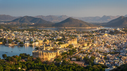 Panoramic aerial view of Udaipur city also known as city of lakes from Karni Mata Temple, Rajasthan. Udaipur city is a popular honeymoon destination among tourist in India.