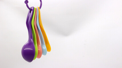 Measuring spoons in various colors