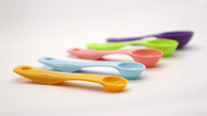 Measuring spoons in various colors