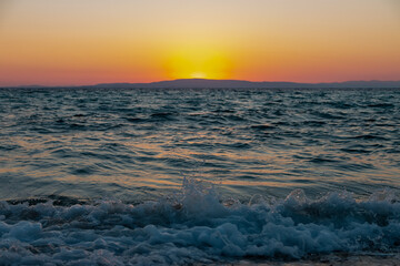 Fototapeta na wymiar colorful relaxing sunset over the sea