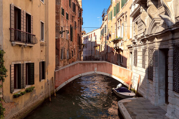 Venice. Old stone traditional houses over the canal.