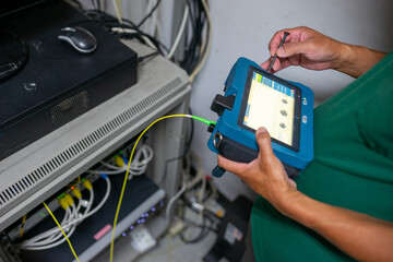 Testing signal  Fiber optic cables for readiness for use - obrazy, fototapety, plakaty