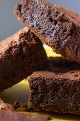 Detail of a stack of tree chocolate brownies.