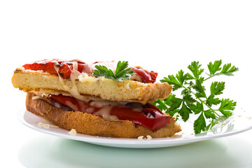 hot sandwich of fried toast bread with baked peppers and cheese