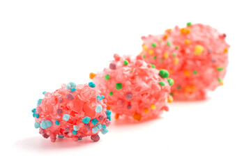 Freeze Dried Sweet and Tangy Candy with Small Candies on the Outside of a Chewy Center  Isolated on...