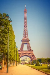 Schilderijen op glas Eiffel Tower over blue sky in Paris, France © sborisov
