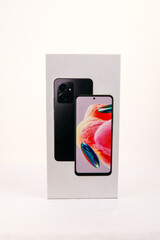 Photo of cell phone box on white background