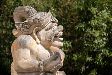 Balinese stone sculpture, traditional balinese statue. Asia and Indonesia culture