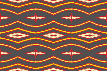 Ethnic abstract purple Seamless ikat pattern in tribal, folk embroidery, and Asia style. Aztec geometric art ornament print. Design for carpet, wallpaper, clothing, wrapping, fabric, cover.
