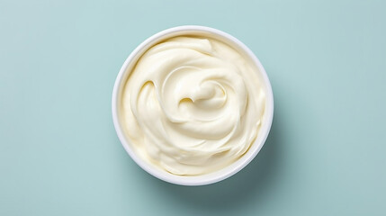 Bowl of tasty sour cream on wooden table