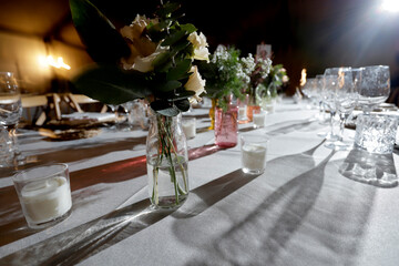 wild decoration of banquet table with lights and shadows