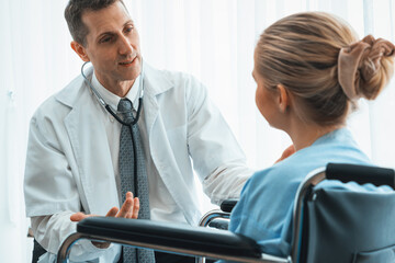 Doctor in professional uniform examining patient at hospital or medical clinic. Health care ,...