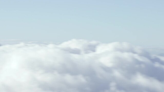 Rolling clouds high above Hawaii Maui