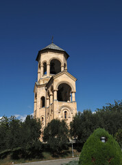 Fototapeta na wymiar Bell tower of the Holy Trinity Cathedral in Tbilisi