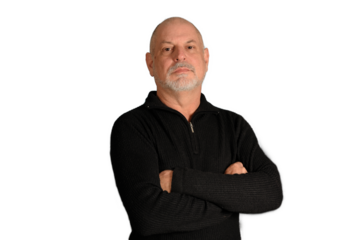 man with white beard gentleman in black shirt colored background landing in studio