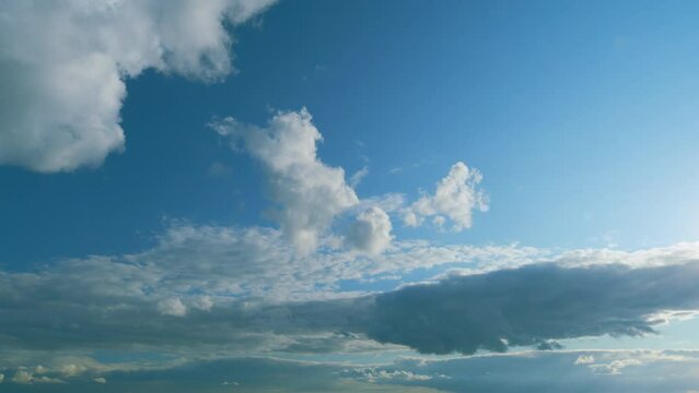 Tropical Summer Sunlight. Various Layers Of Clouds Move In Different Directions At Altitude. Timelapse.