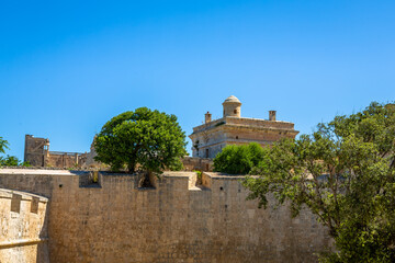 Fototapeta na wymiar Detailed exposure of Mdina architecture. Mdina is one of Europe's finest examples of an ancient walled city and extraordinary in its mix of medieval and baroque architecture.
