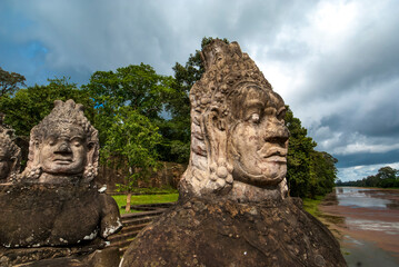 Fototapeta premium Bridge with statues of gods and demons, Angkor Thom, Angkor, Siem Reap province, Cambodia, Asia