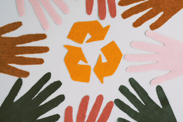 Symbol recycling with gloves of different colors in a circle. Ecological and sustainable fashion....
